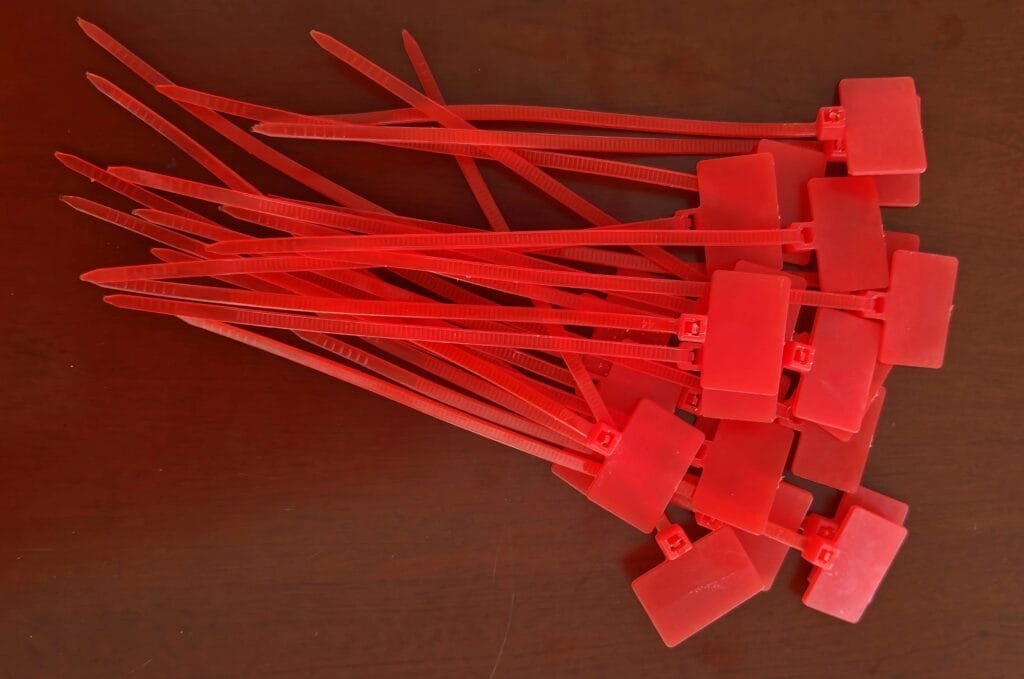 red zip tie labels